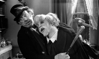 Two actors on the set of The Elephant Man.