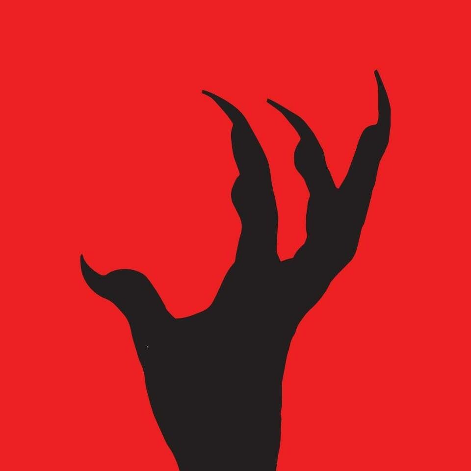 red background with black claw silhouette