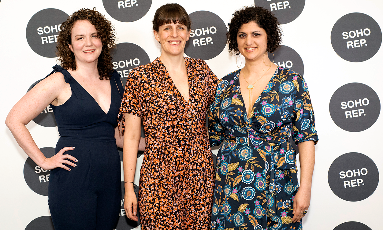 three people posing for a photo at a soho rep event