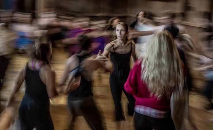 blurry photo of a group of women dancing