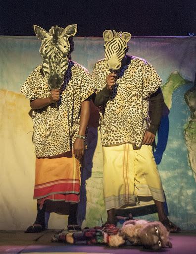 two men with zebra masks on