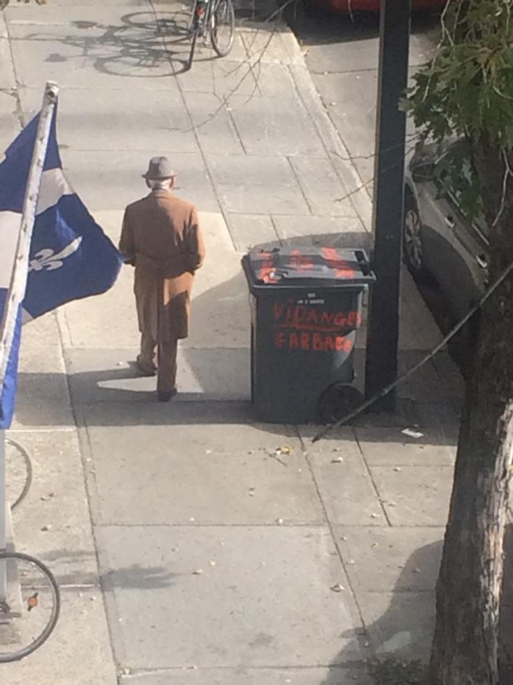 man walking along street