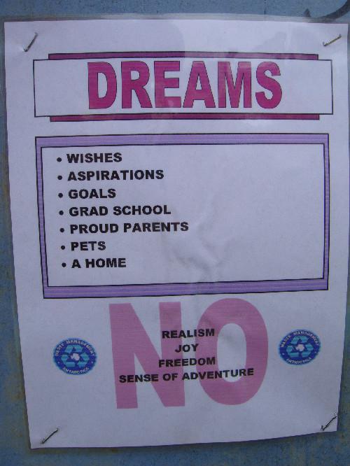 A printed sign labelling the DREAMS bin.