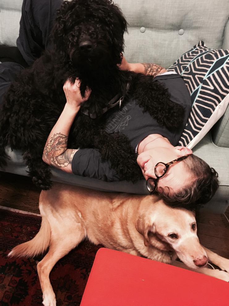 P.carl with dogs on a couch 