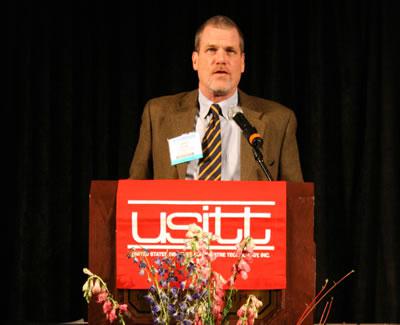 Gregg Henry speaking at USITT.