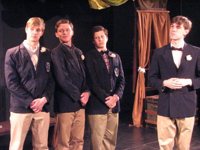 Photo of the four leads in "Love's Labour's Lost" standing next to each other on stage.