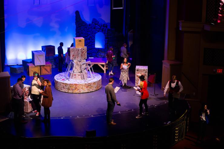 birds eye view of stage with actors and props
