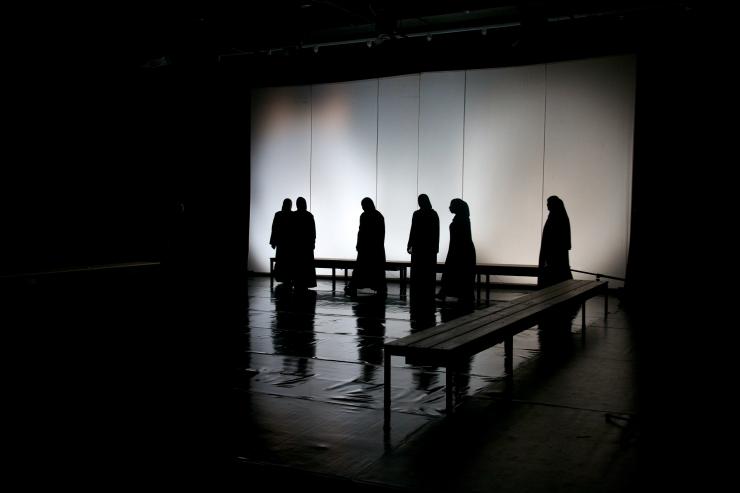 The silhouettes of women on stage 
