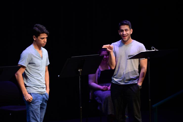 two actors in a staged reading