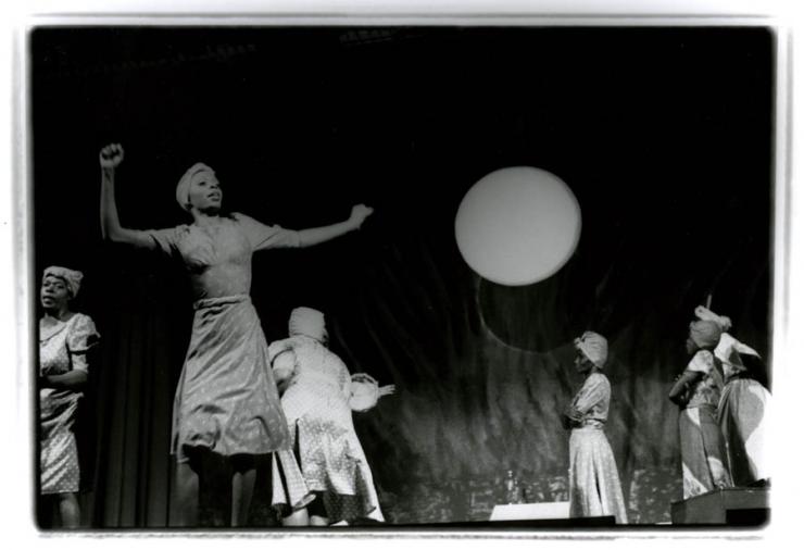 black and white photo of women dancing