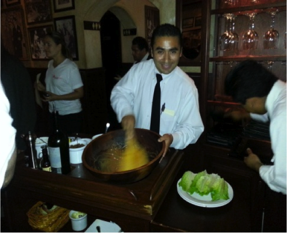 A man stirring ingredients in a bowl