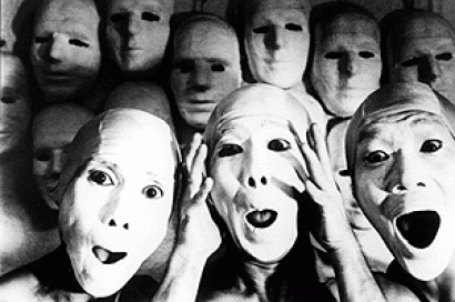 Actors in masks looking at camera 
