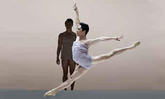 A ballet dancer executes a difficult leap.