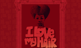 A woman looks down at text that reads "I Love My Hair."