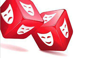 A pair of red dice with theatrical masks on them.