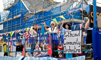 a group of people in costume at the Porthcawl Carnival
