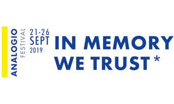 white background with blue text Analogio: in memory we trust