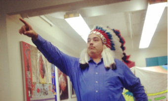 a man in a Native American headdress