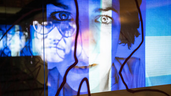 digital image of woman's face in blue