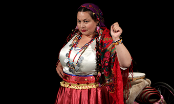 performer dressed in traditional roma woman's clothing,
