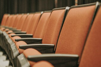 A close up of theater seats.