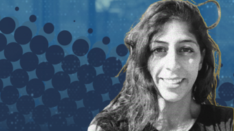 Image of a woman in front of a digital background.