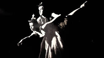 A black and white photo of two dancers.