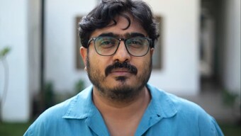 headshot of Abhishek Majumdar.