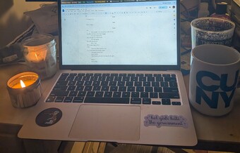 A laptop with a play in progress typed on it.