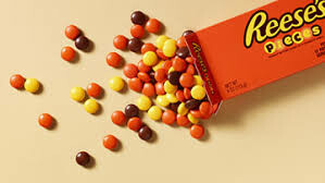 Reese's Pieces spilling out of the box.
