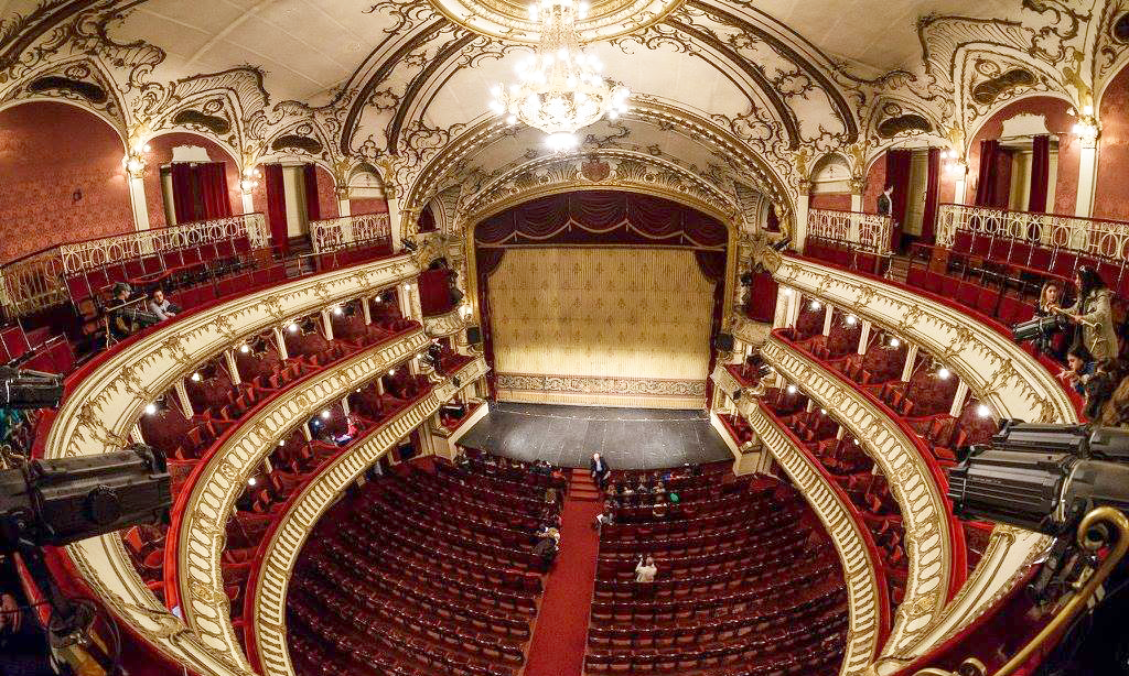 interior of a large, ornate, early 20th century theatre