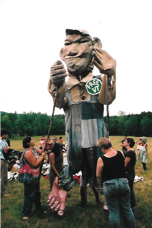 Plummer assisting with large-scale puppetry for the Bread and Puppet Theatre.