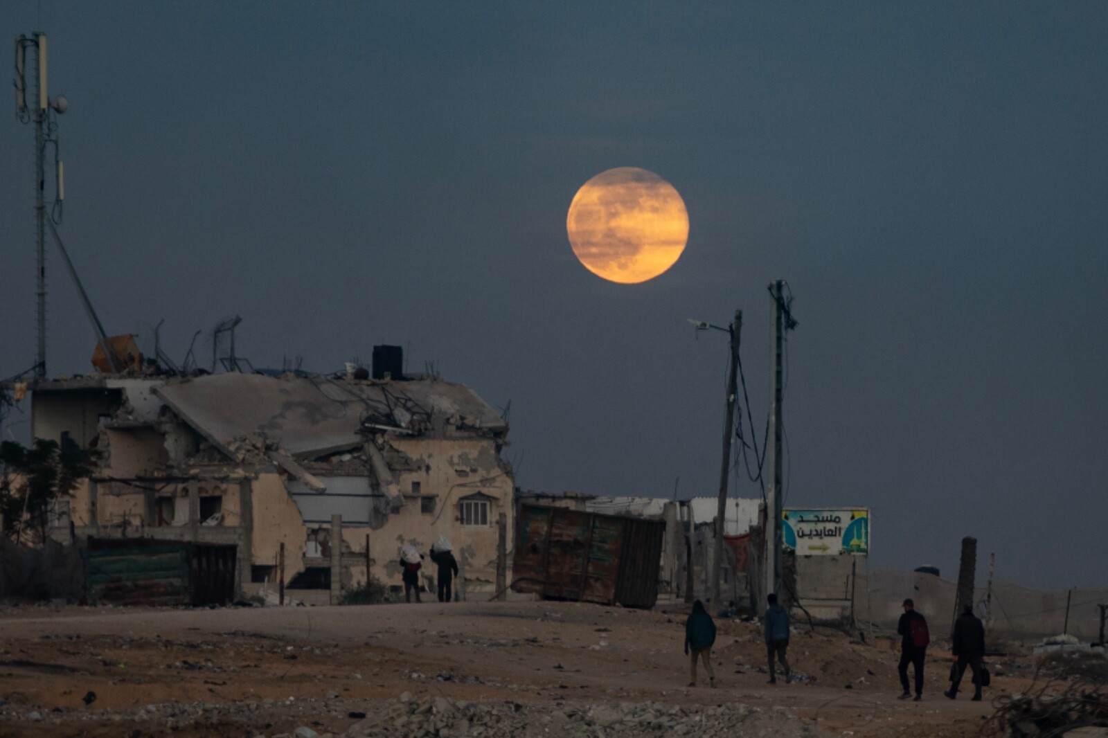 A full moon rises over Gaza. 