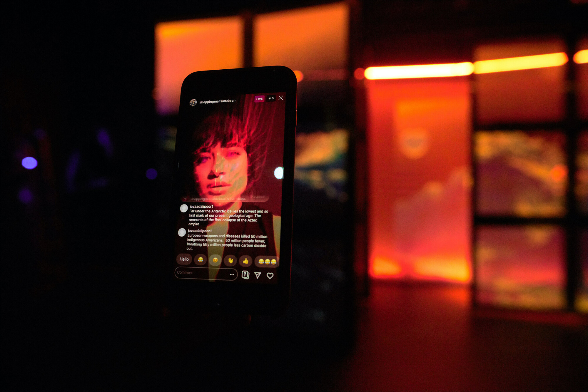 A phone displaying an Instagram Live Story. 