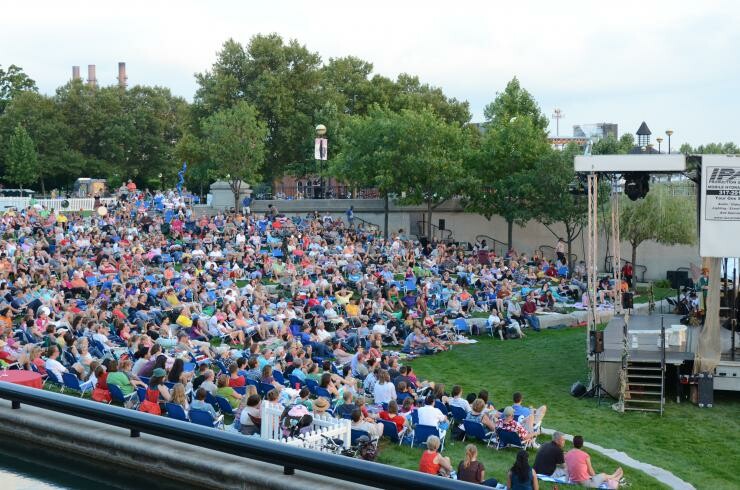 A crowd on a lawn.