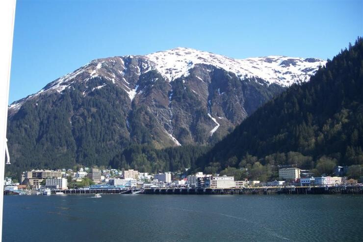 A mountain near a body of water.