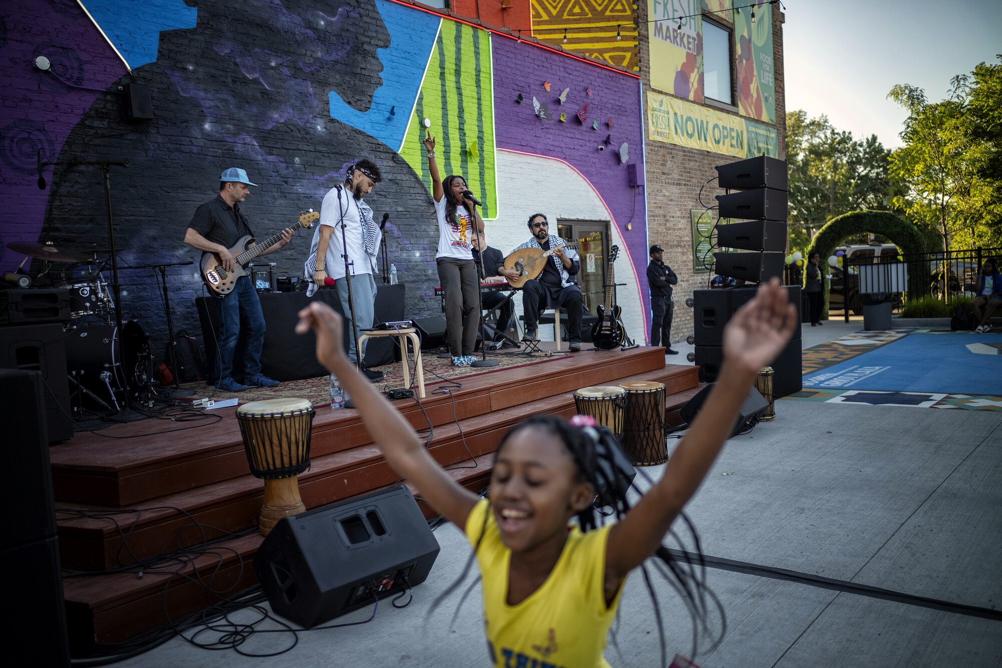 A child dancing to live music.