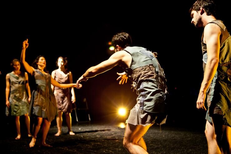 A group of actors on stage.