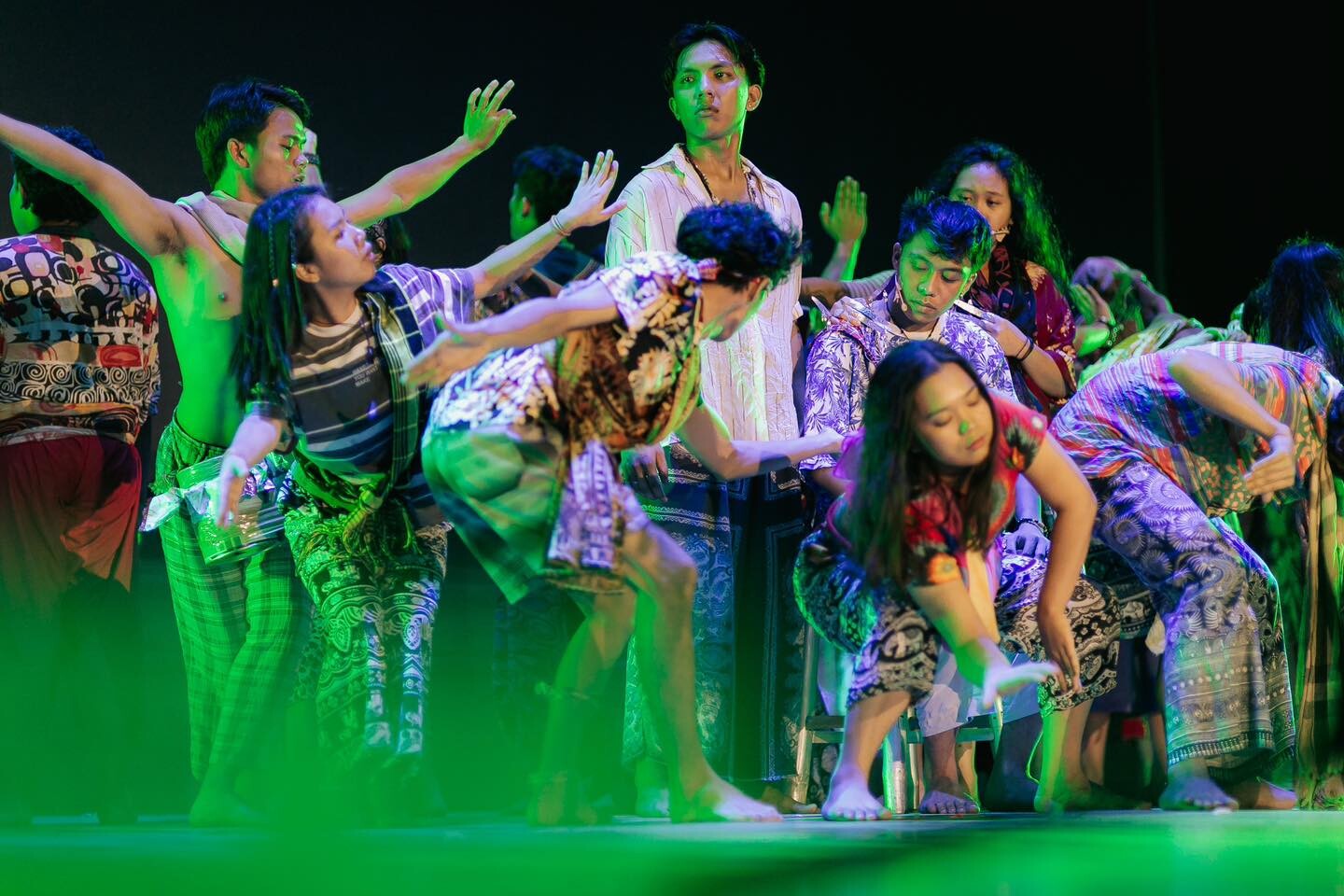 A group of people dancing on stage.