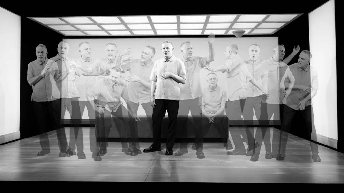 A black and white photo with a man standing in different positions superimposed across the whole image.