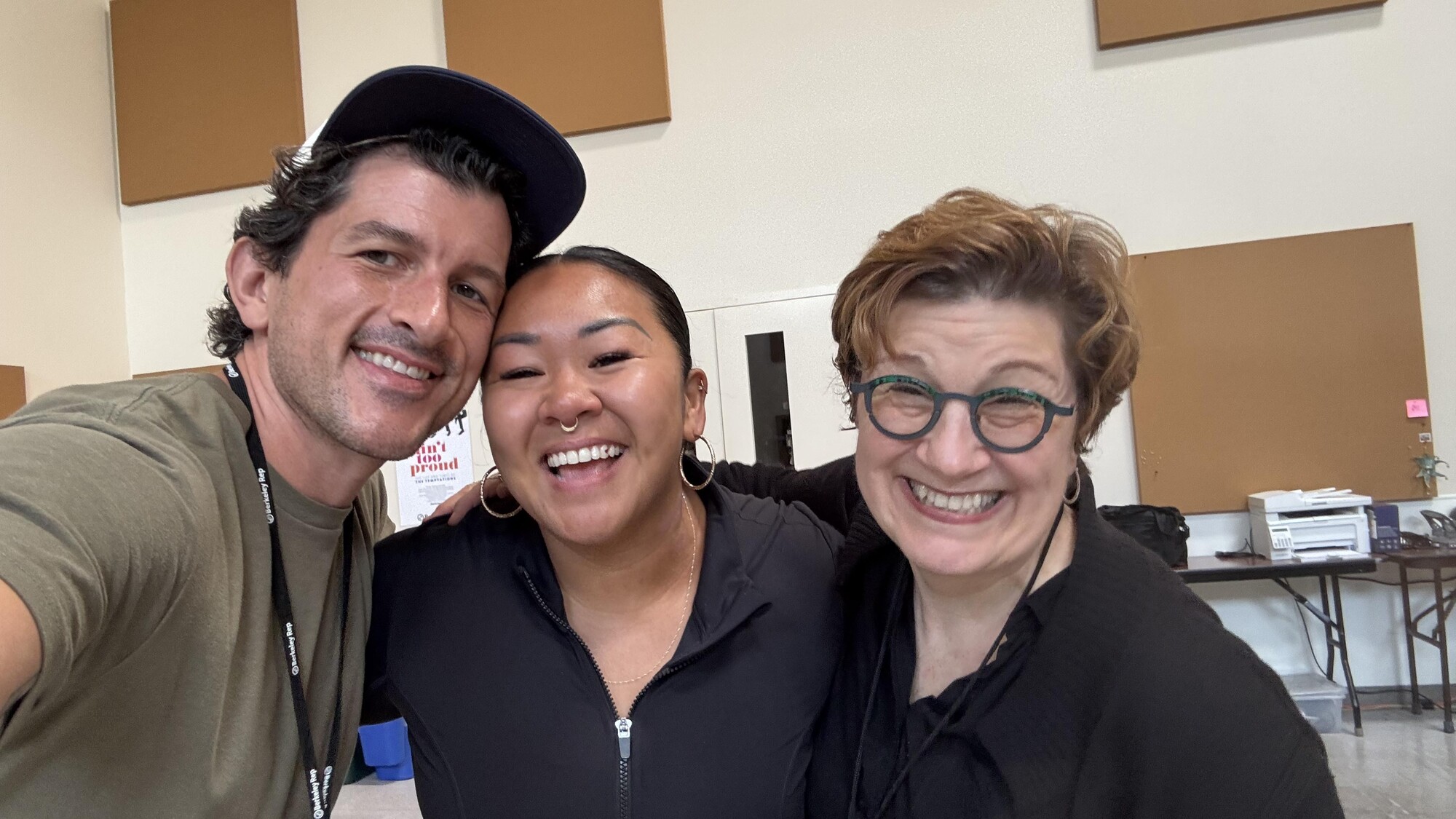 Three people gathered for a selfie.