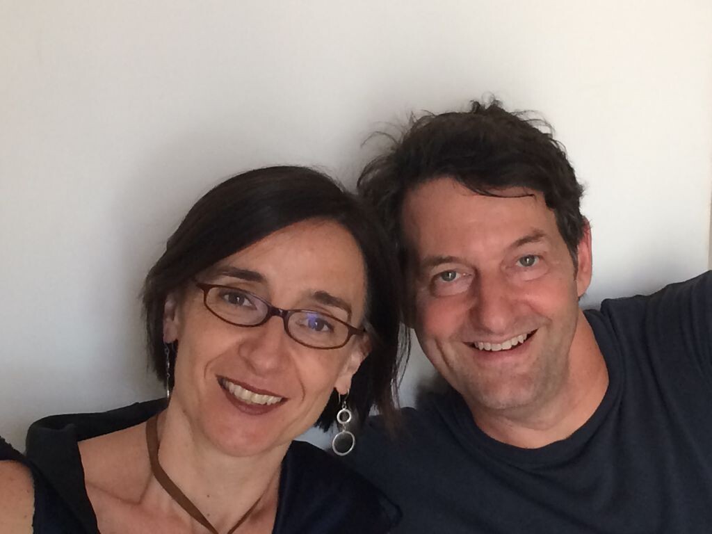 Two people smiling in a selfie.