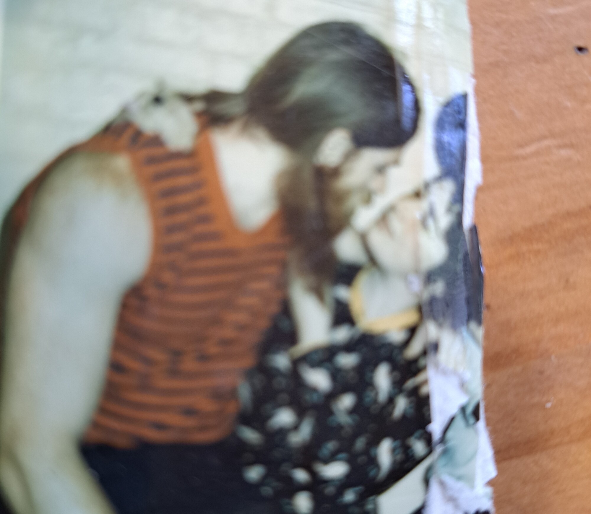 A photograph of two people embracing.
