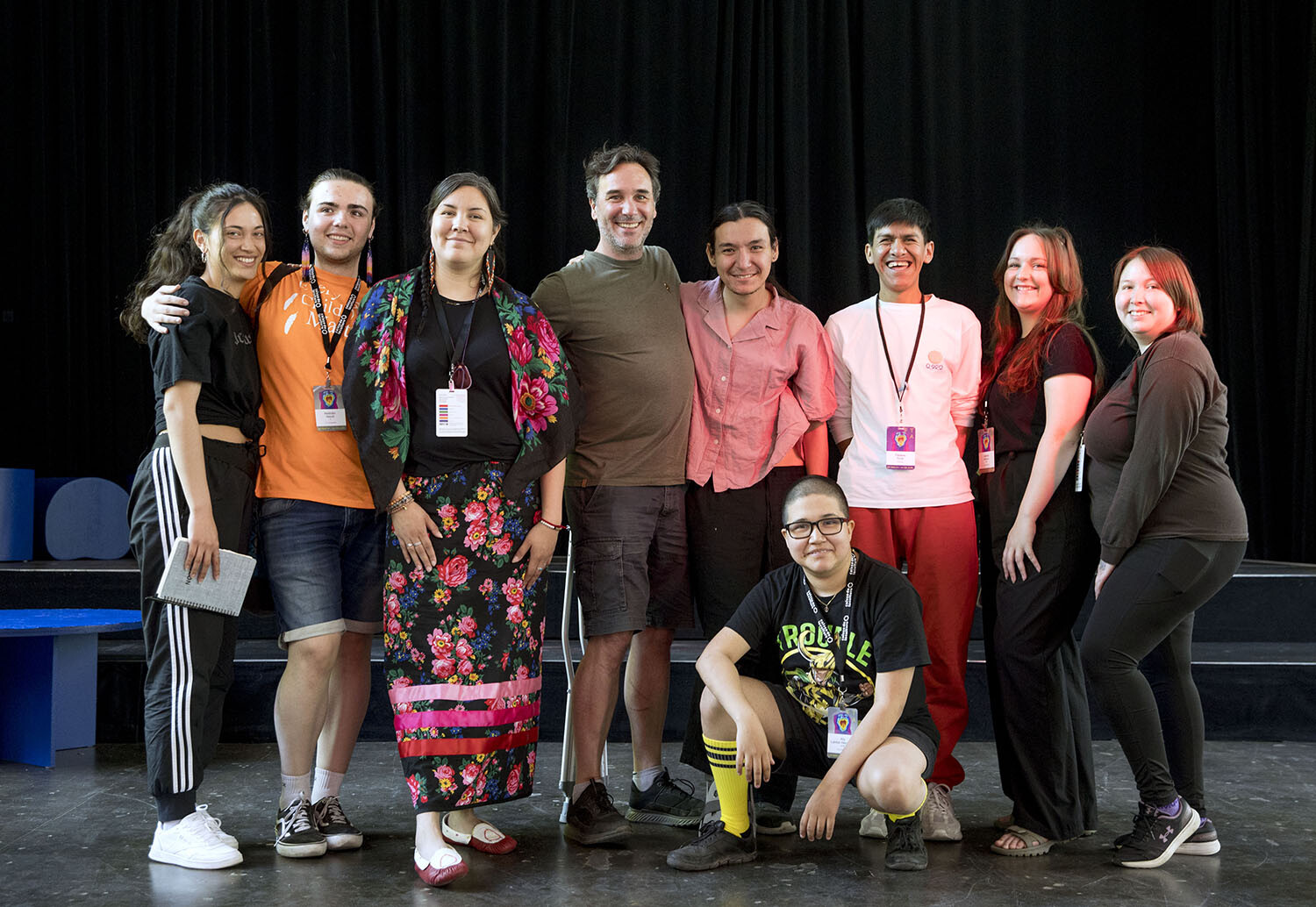 A group of people pose for a candid photo.