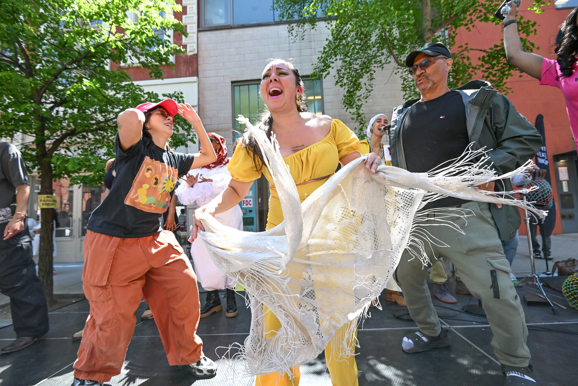 An outdoor performer dances.