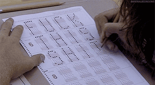 GIF of someone filling in an answer sheet for a standardized test so the answer bubbles form the words "Fuck this shit".