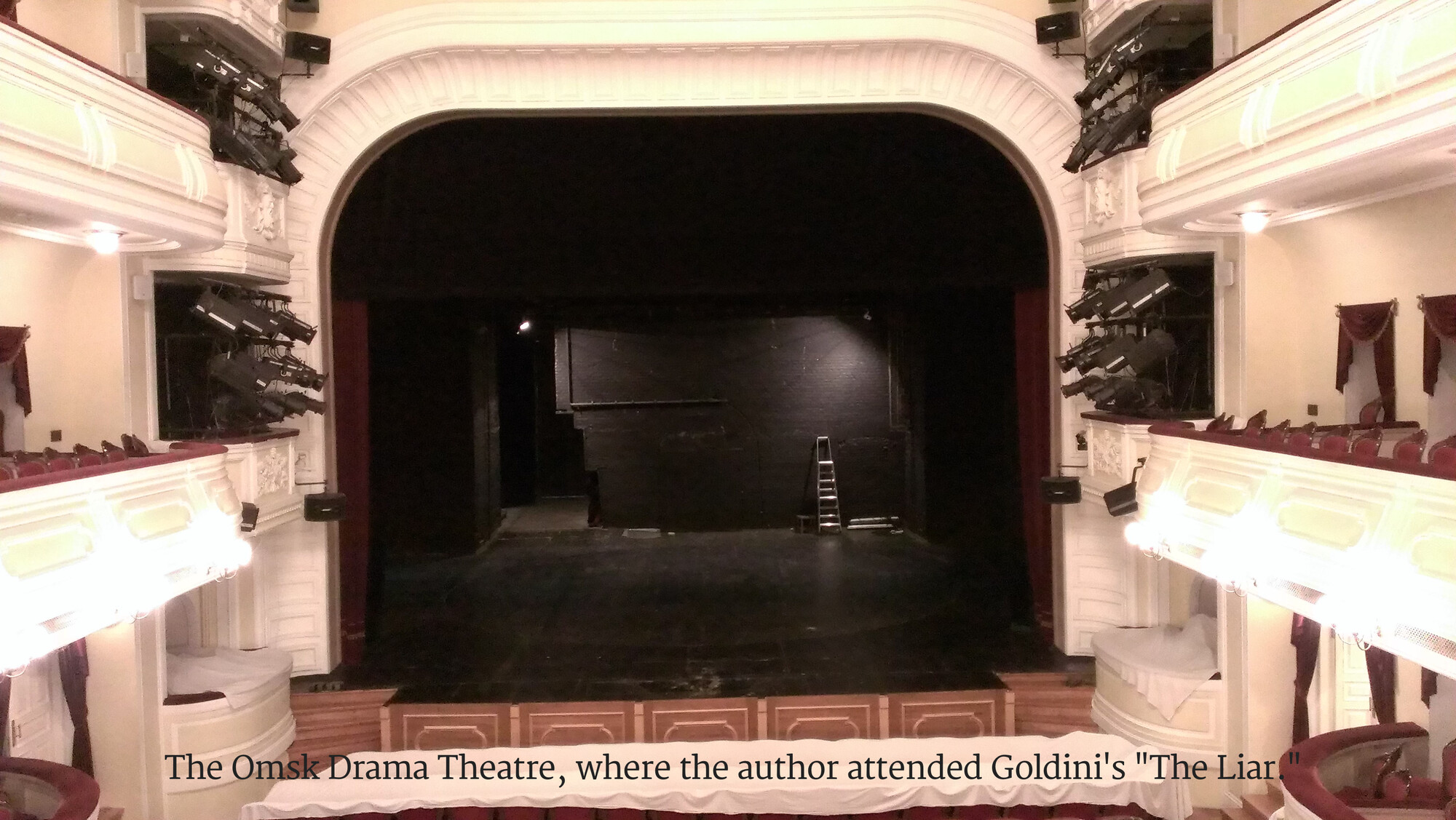 The interior of the Omsk Drama Theatre as seen from the audience's perspective.